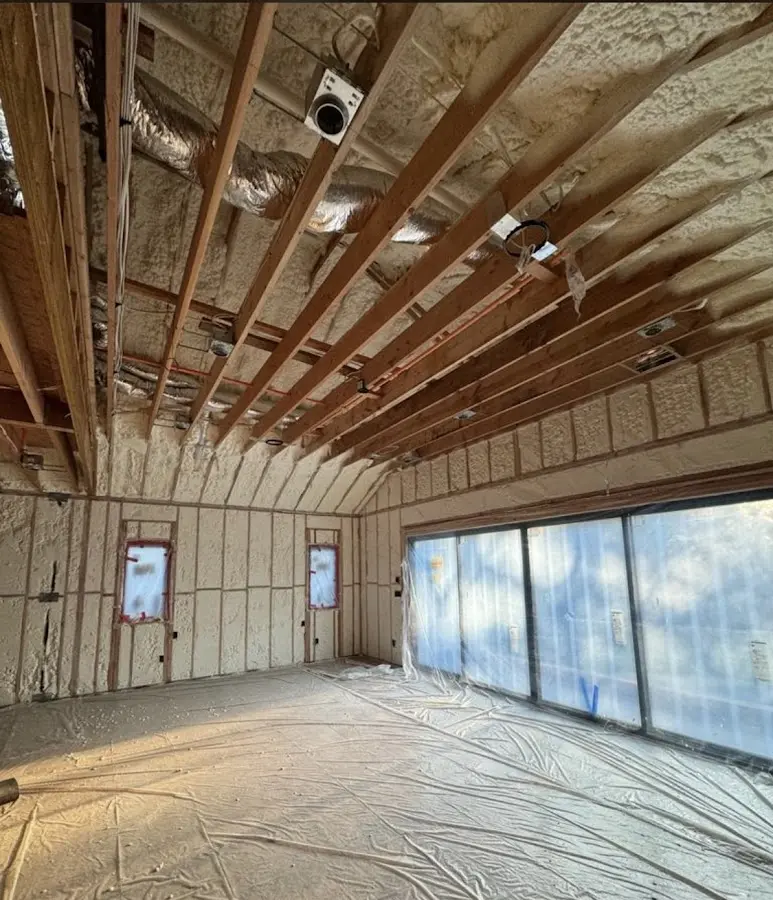 Interior walls and ceiling insulated with spray foam during new construction in Ruidoso